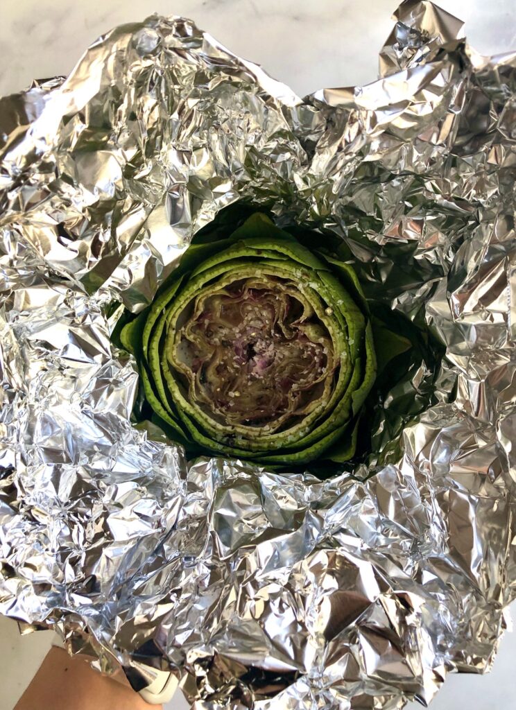 Image of roasted artichoke cooked in foil