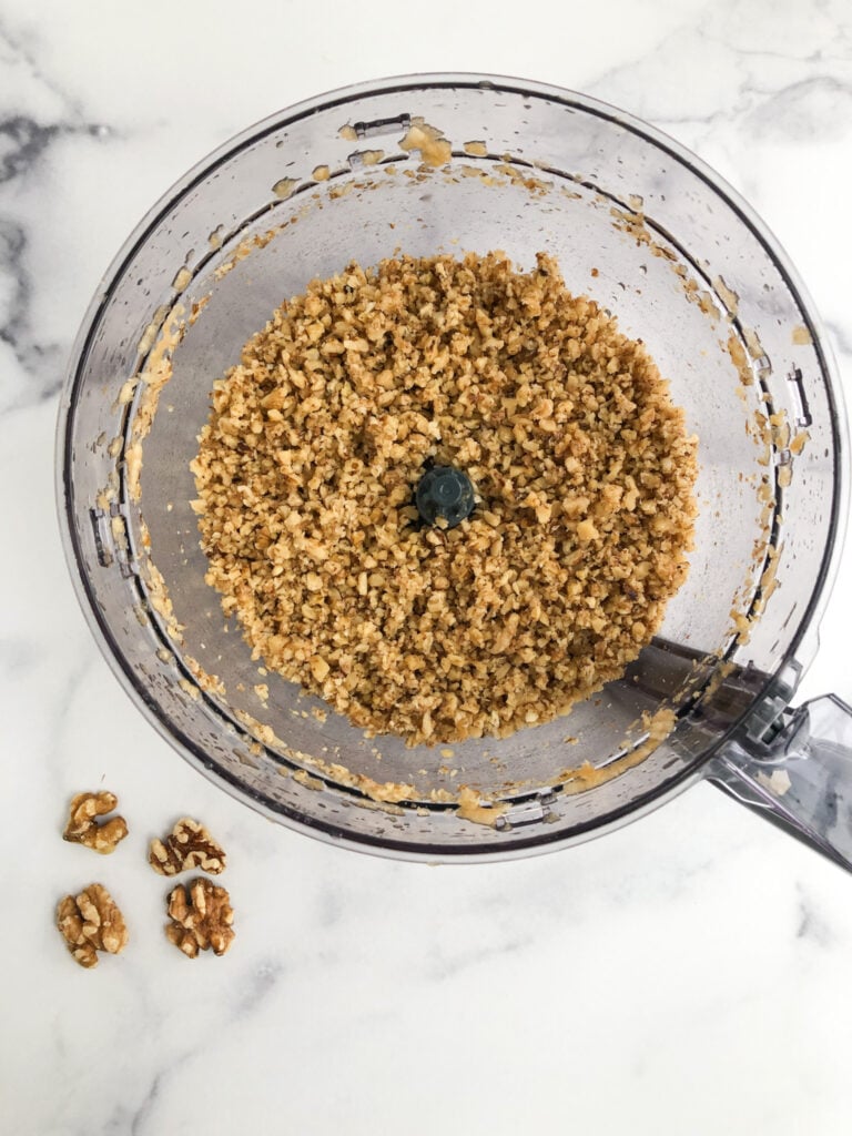 chopped walnuts in food processor