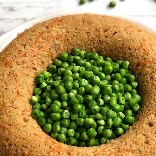 Header image for carrot ring - final carrot ring filled with peas