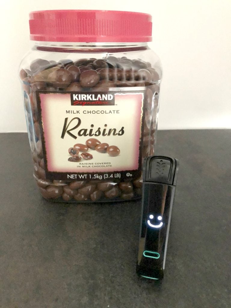 Nima displays smiley face, indicating Kirkland chocolate raisins are gluten free