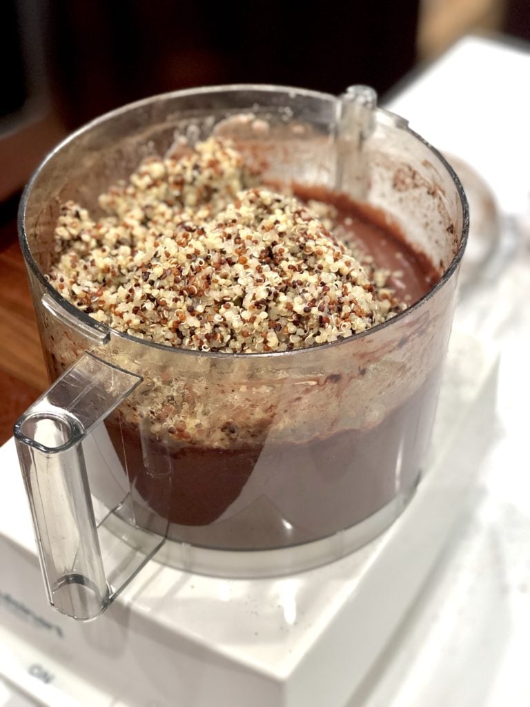 Blending quinoa into chocolate cake batter