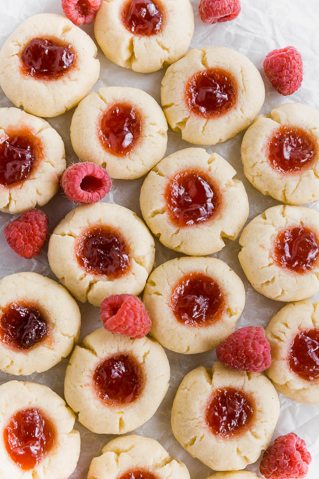 A bunch of gluten-free Raspberry Thumbprint Cookies on a tray