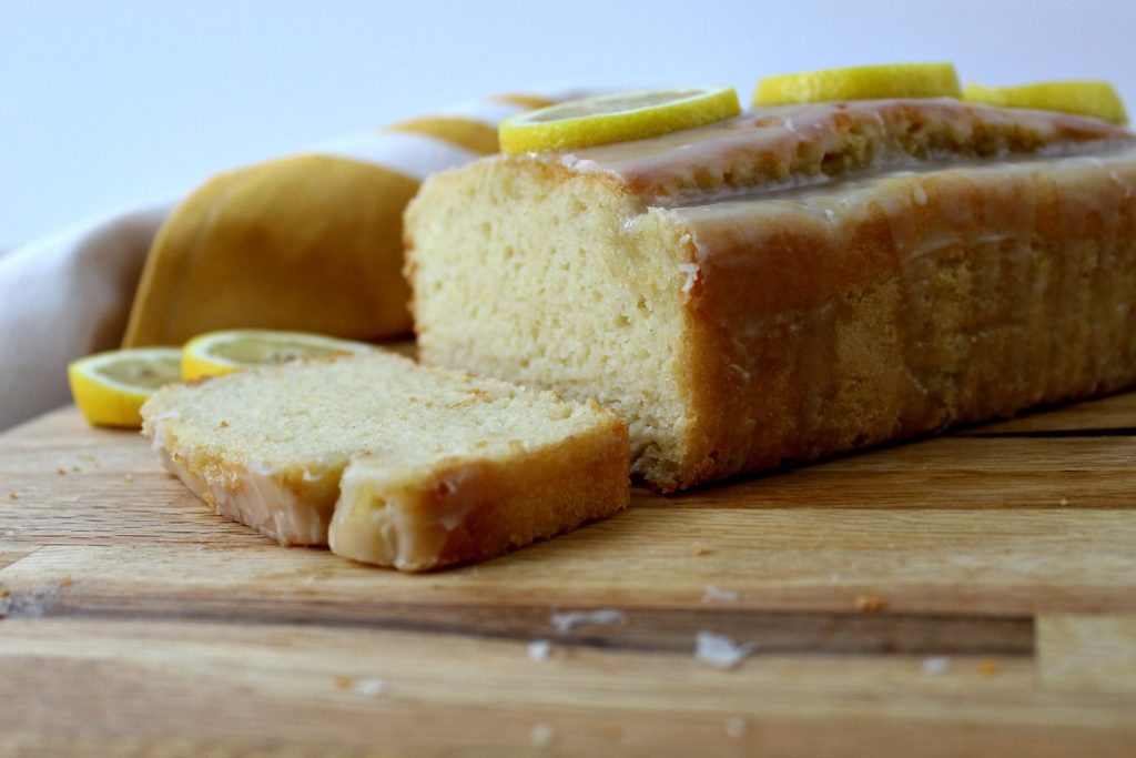 Horizontal close up on lemon pound cake with slice