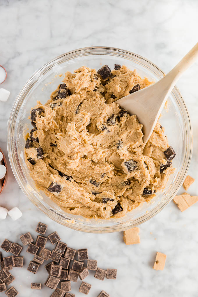 gluten-free s'mores cookies dough in a bowl with chocolate chucks