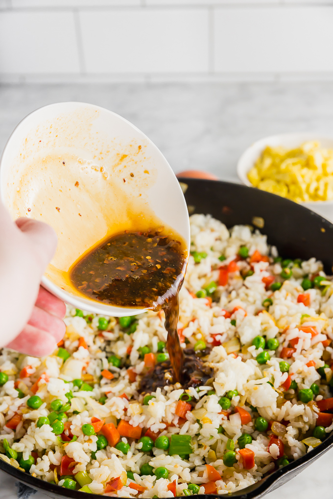 pouring sauce of fried rice recipe