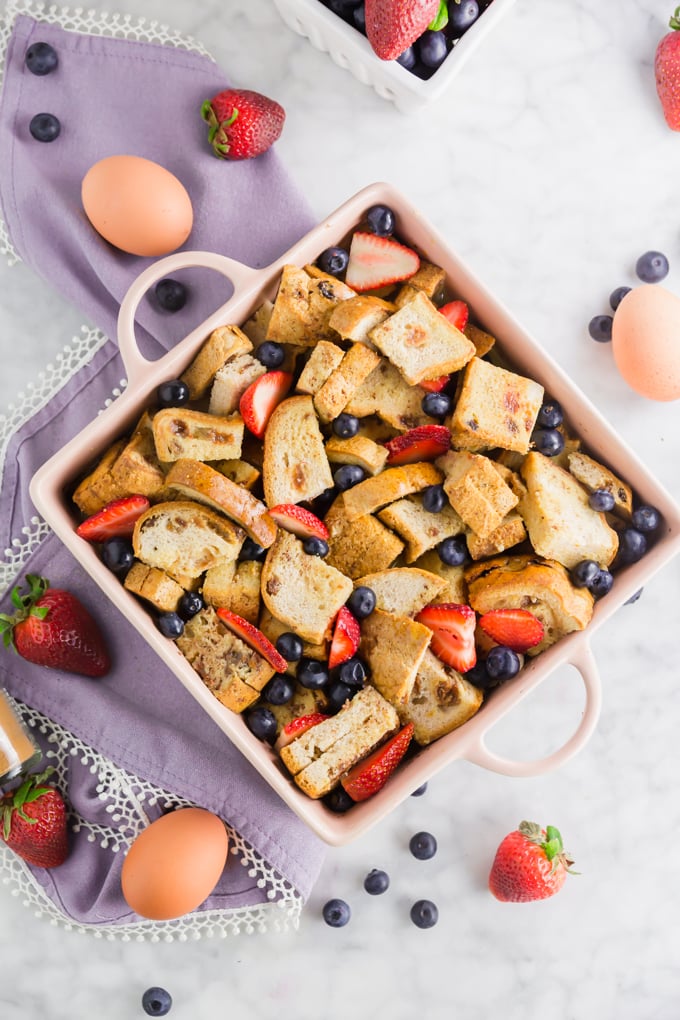 gluten-free french toast casserole before baking with fruit mixed in