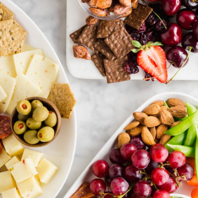 Overhead picture of three snack boards featured in the article