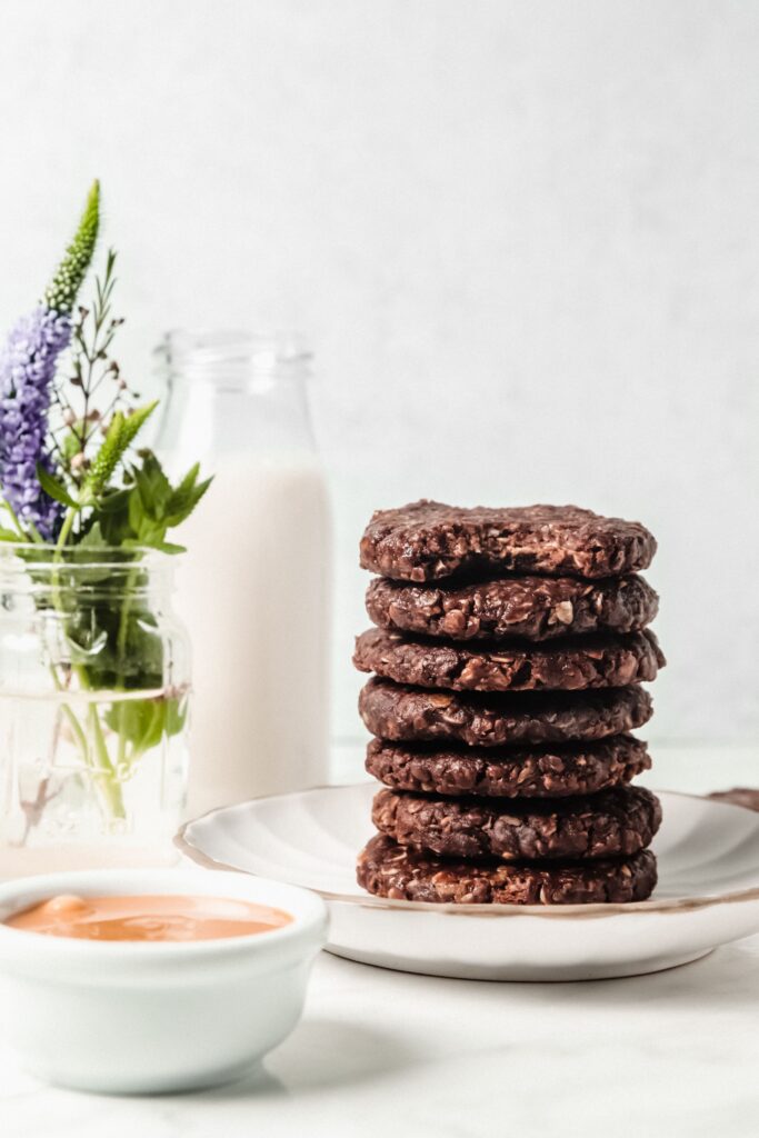 Beautiful stack of no-bake gluten-free cookies made with cocoa, peanut butter and oats.