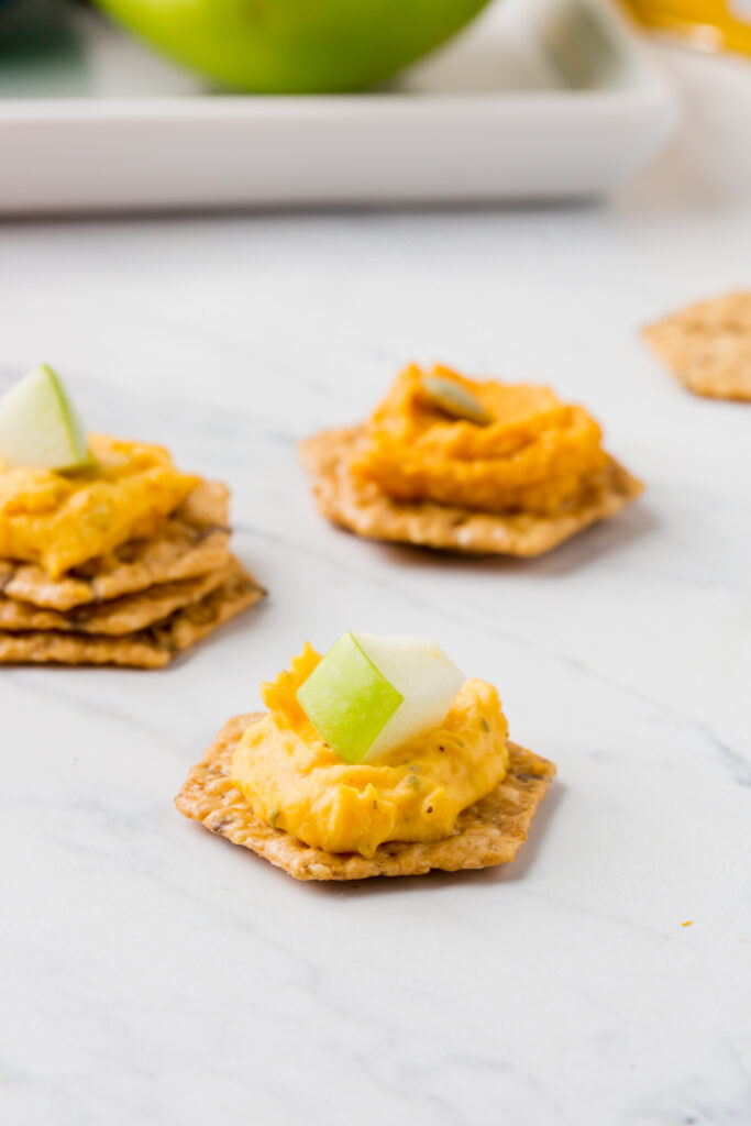 Crunchmaster crackers with butternut squash dip and cubed apples.