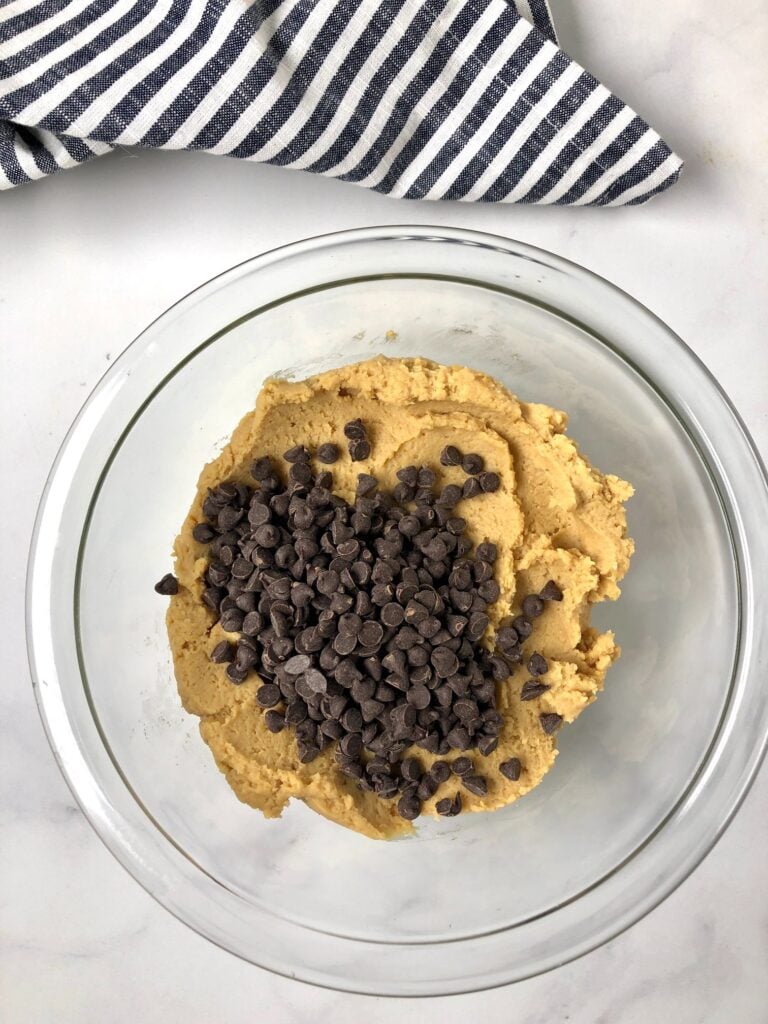 Picture of dough with chocolate chips on top