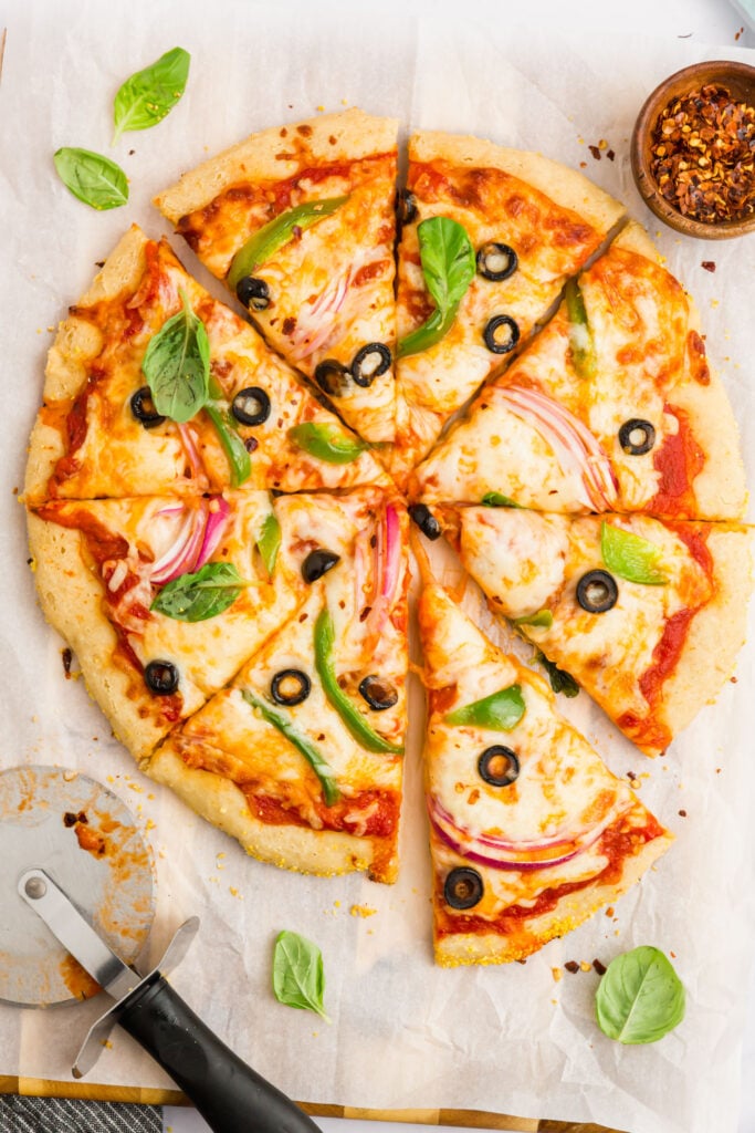 Gluten-free pizza crust from scratch with cheese and vegetable toppings