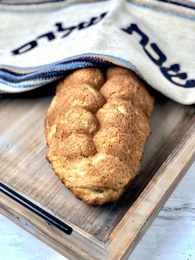 gluten-free challah covered with challah cover