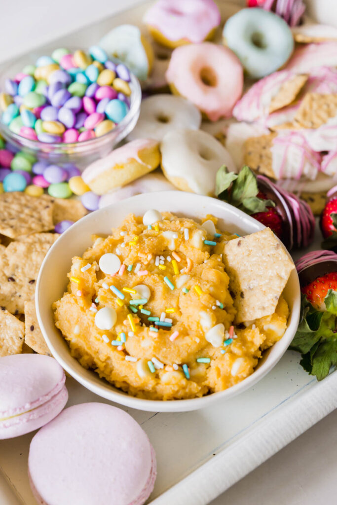 Upclose on the edible cookie dough hummus dip with sprinkles on top