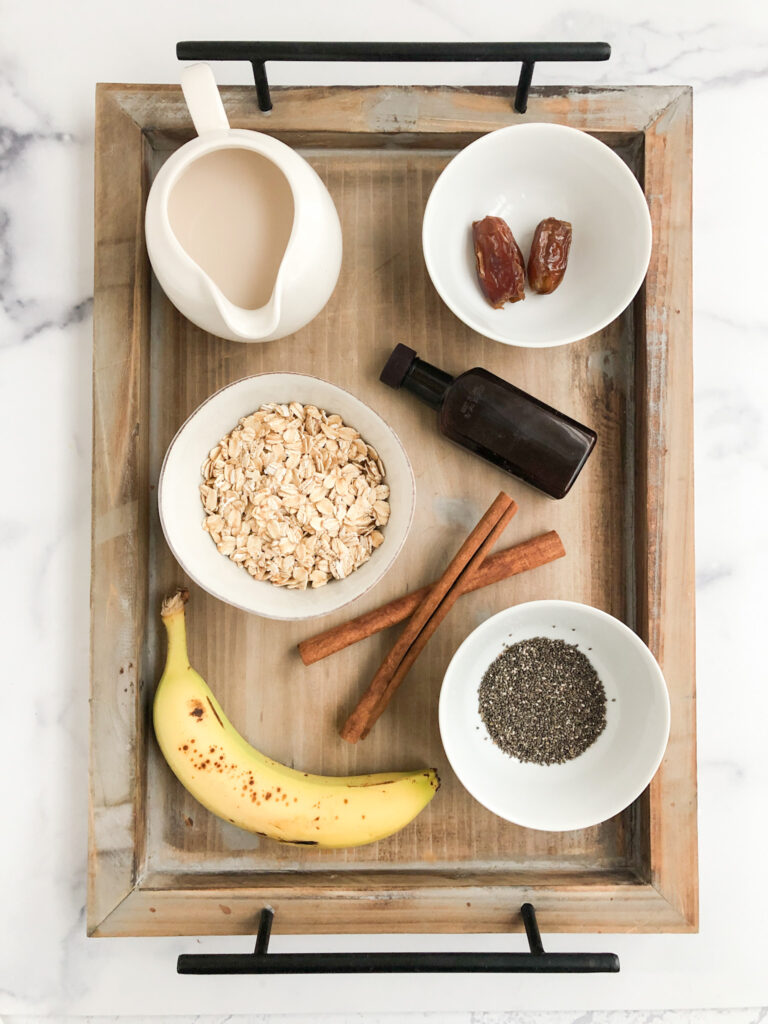 Ingredients for banana oatmeal on a tray