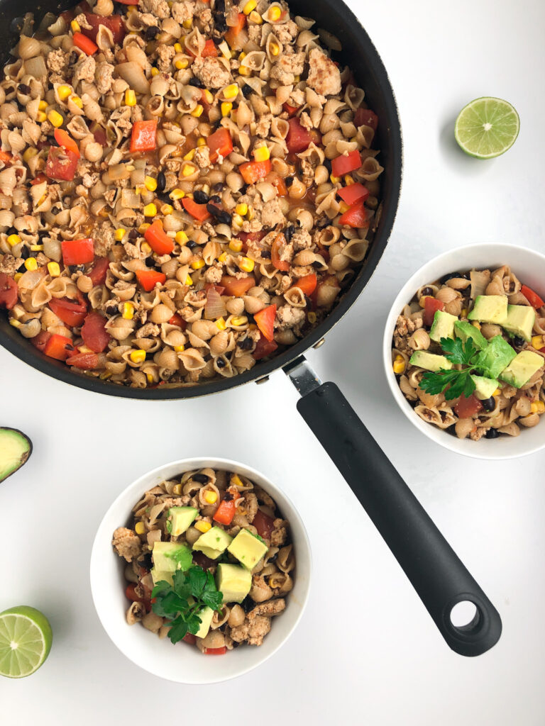gluten-free taco pasta skillet with two serving bowls