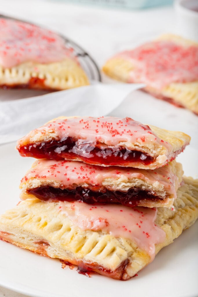 stacked gluten-free pop tarts with gooey jam center visible