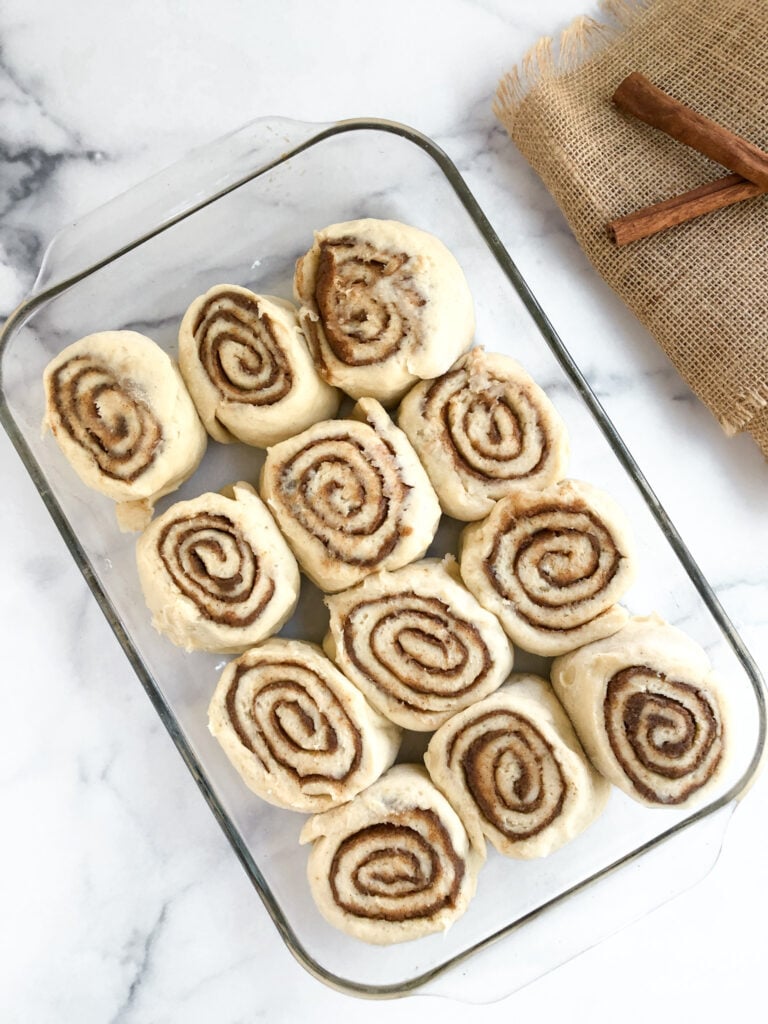 Rolls cut up and placed in a baking dish