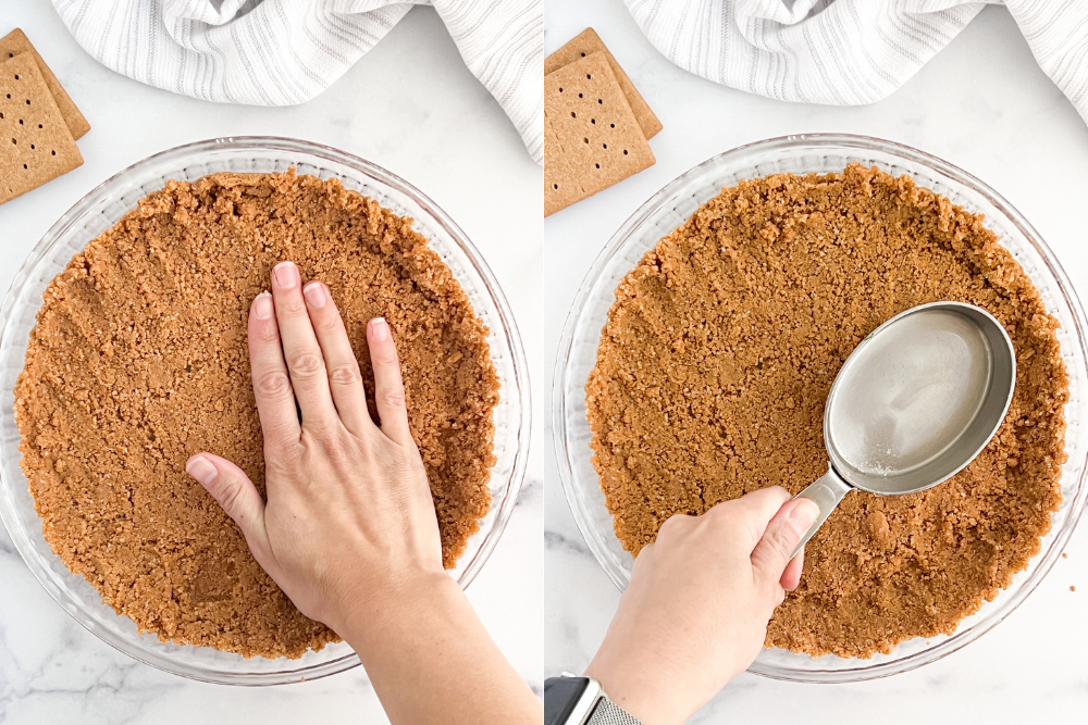 pressing down gluten-free graham cracker crust with hands and measuring spoon to get the pie crust firmly in place