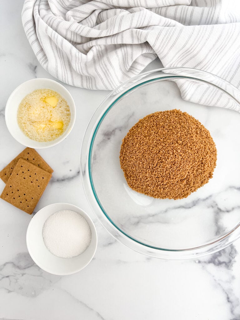 gluten-free graham cracker (crushed) with melted butter and sugar
