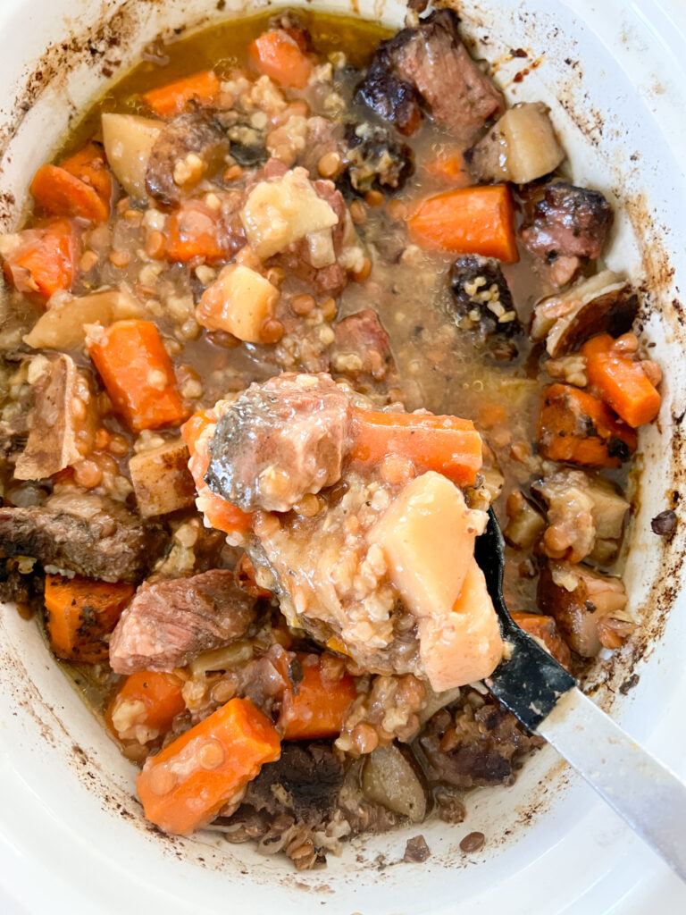 gluten-free cholent in a slow cooker pot
