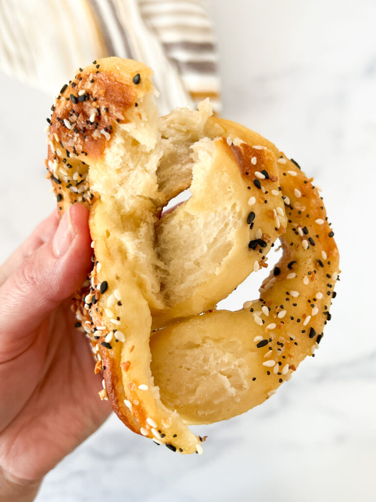 gluten-free soft pretzel broken to see doughy inside