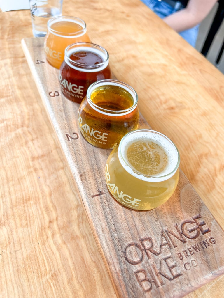 orange bike brewing flight