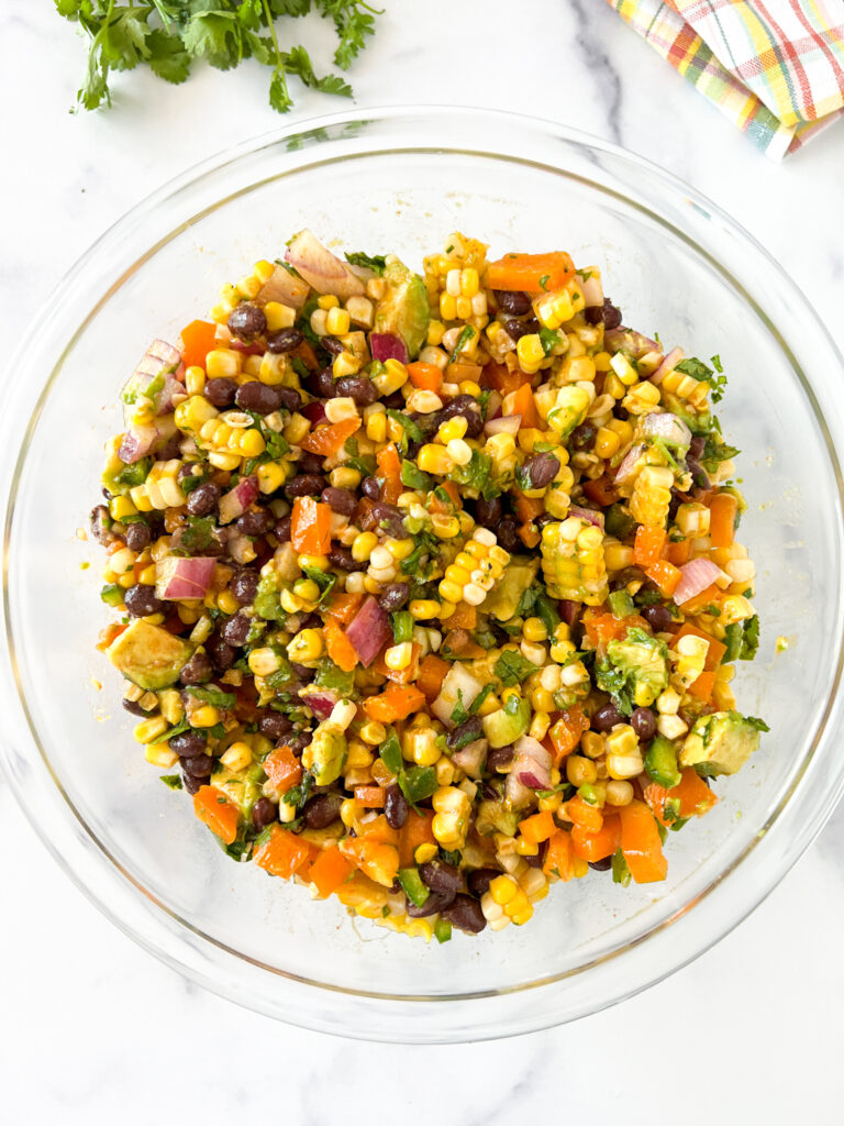 black bean and corn salad with chipotle lime dressing overhead image