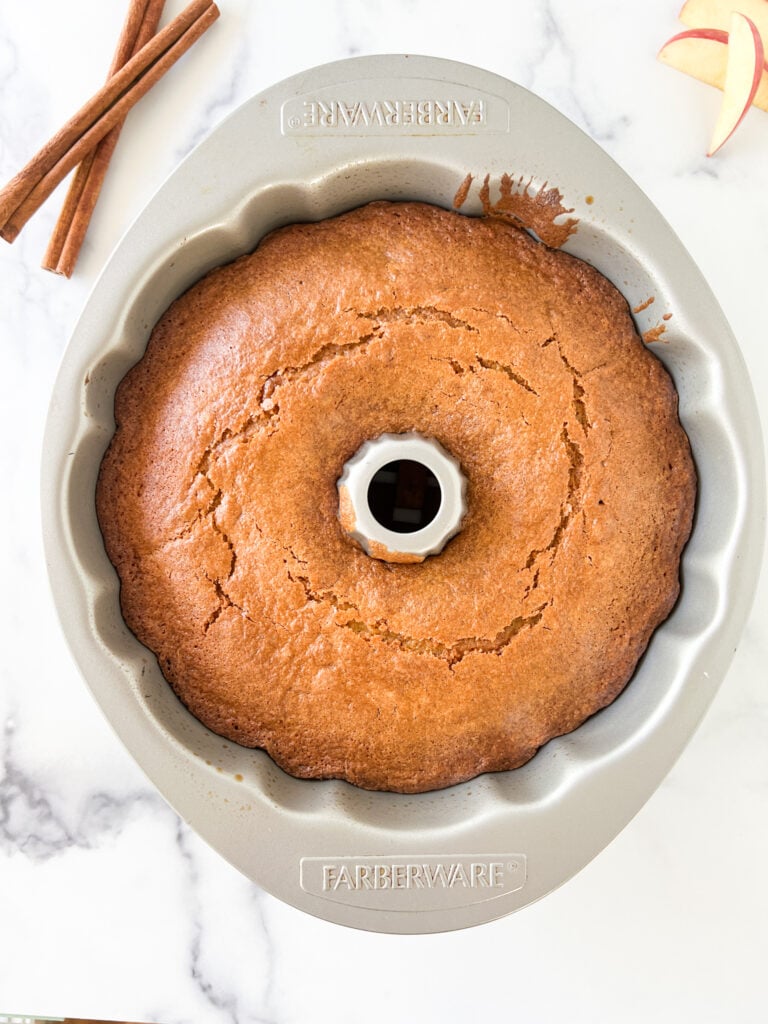 the apple cake inside the bundt pan baked