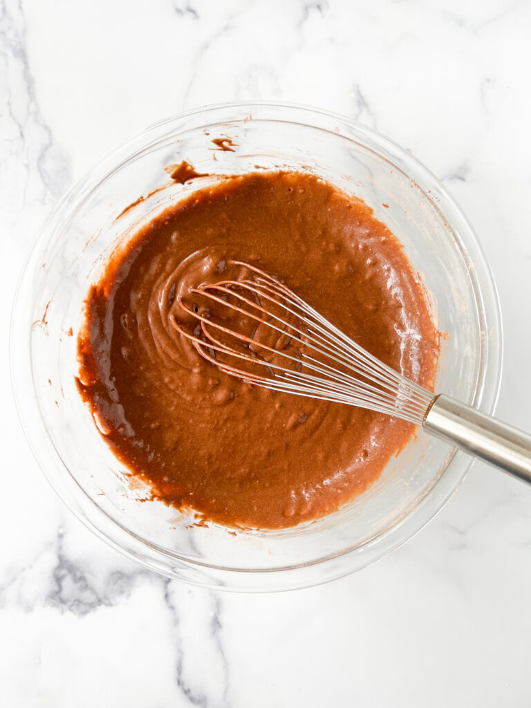 gluten-free chocolate donut batter with whisk
