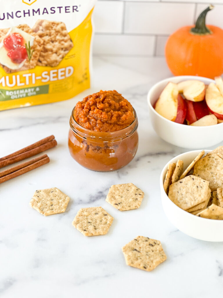 Gluten-free maple pumpkin butter in a jar with crackers