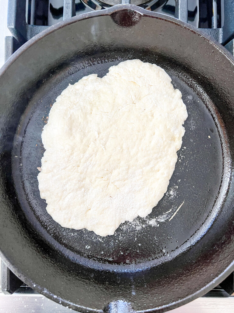 naan in a cast iron skillet