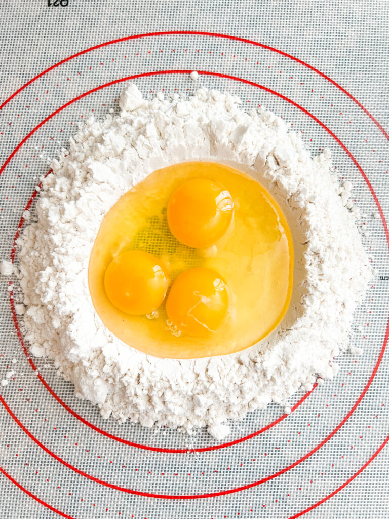 flour well with eggs inside