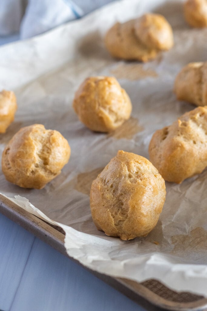 golden brown cream puffs baked
