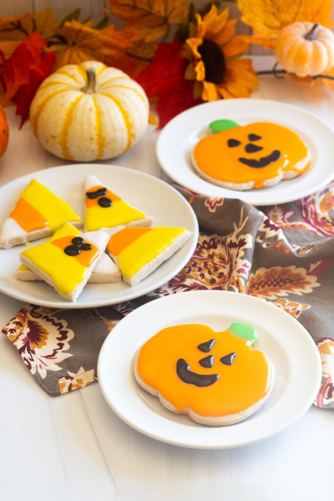 jack-o-lantern and candy corn shaped halloween cookies