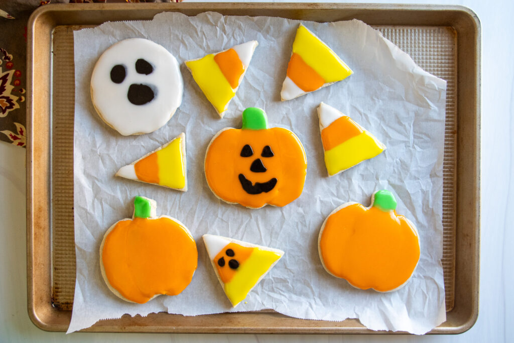 gluten-free cookies in halloween shapes on a baking sheet
