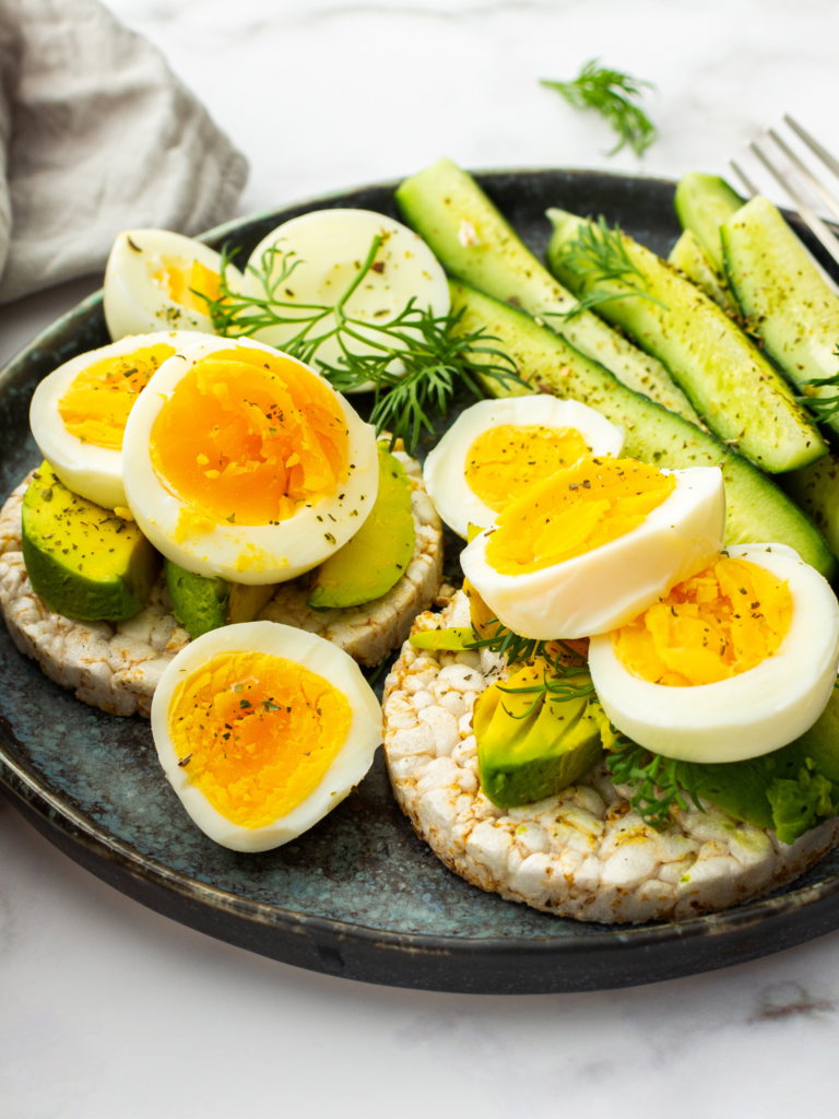 eggs and avocados on rice cakes
