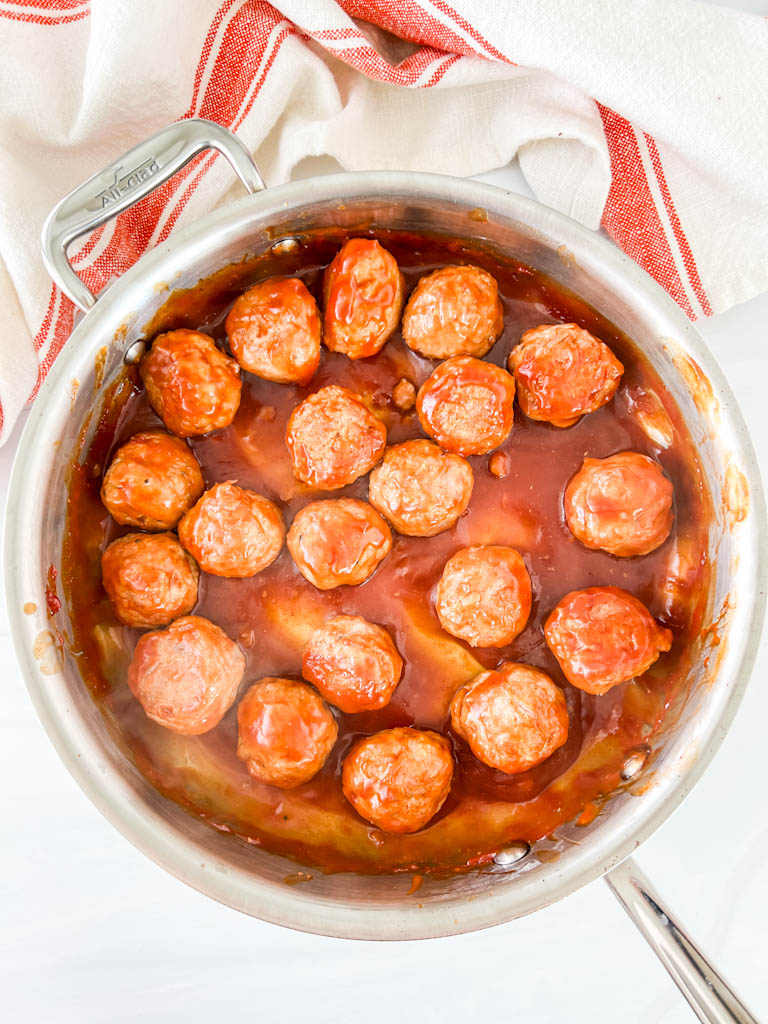 sweet and sour meatballs in a pan