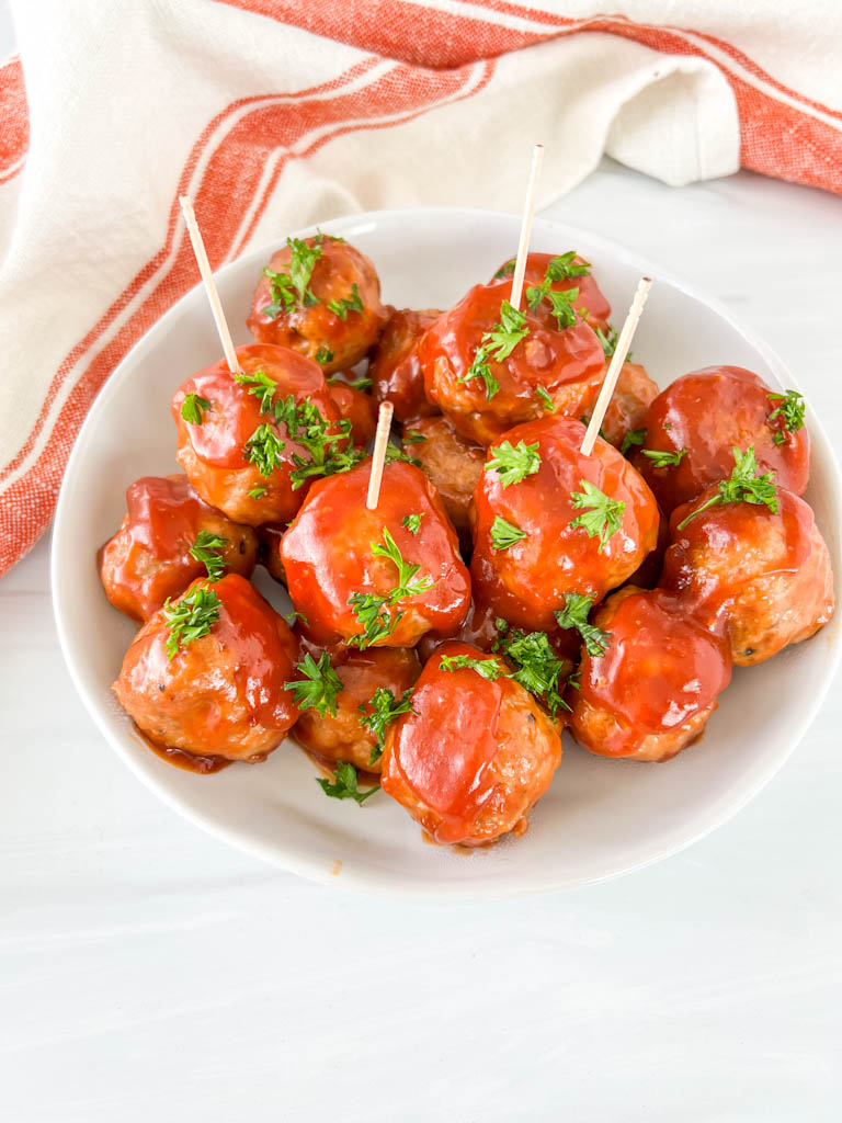 sweet and sour meatballs with toothpicks
