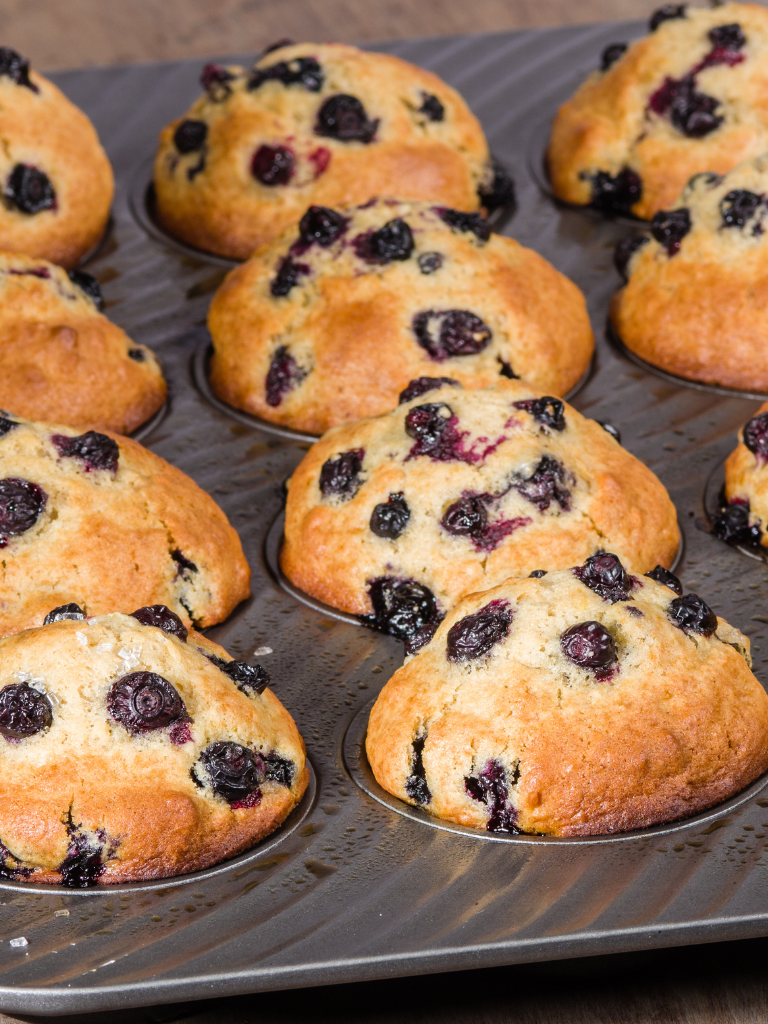 muffins overflowing in pan